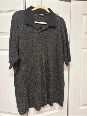 Axist Black and Gold Accents Polo with Subtle Swirl Pattern